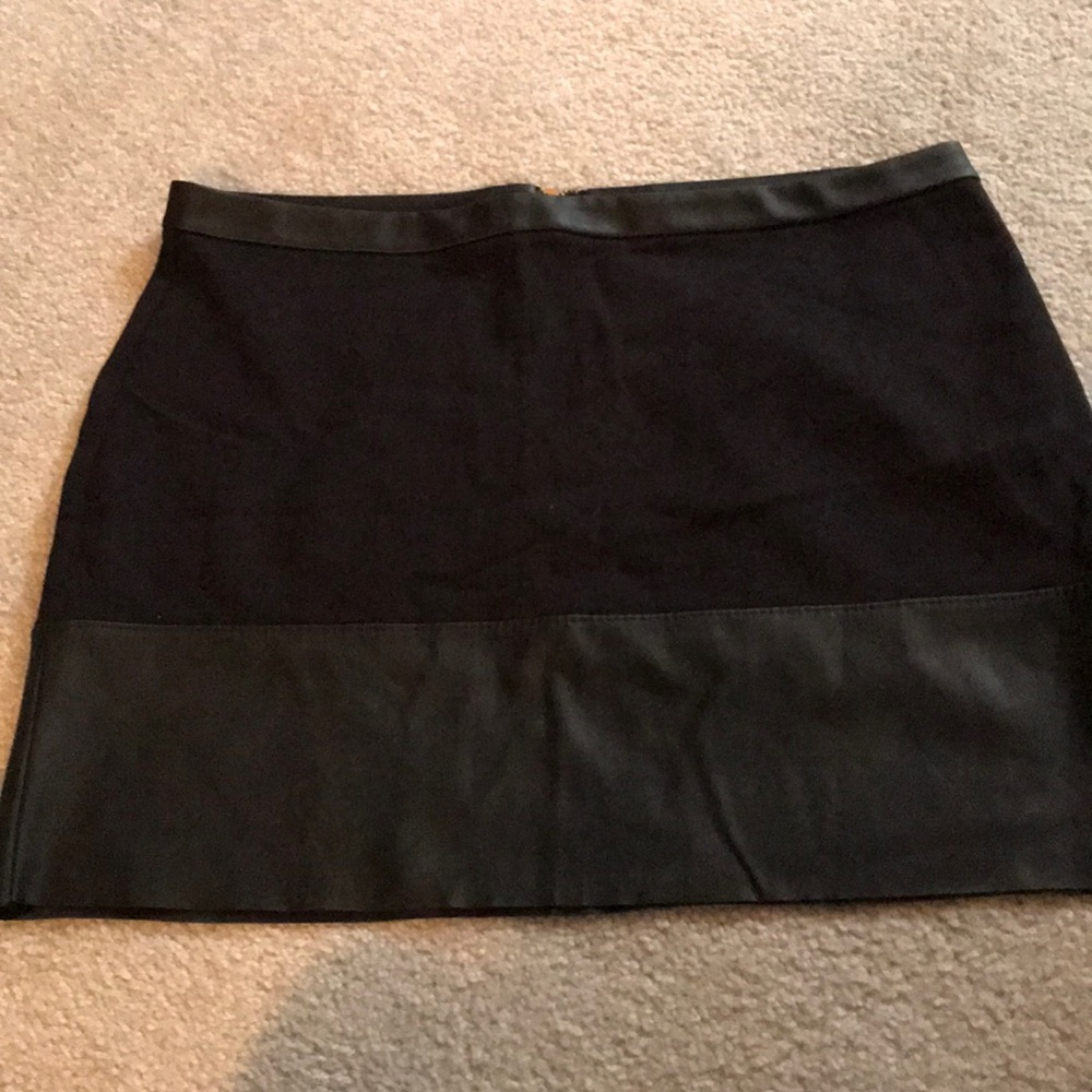 Black leather mini skirt